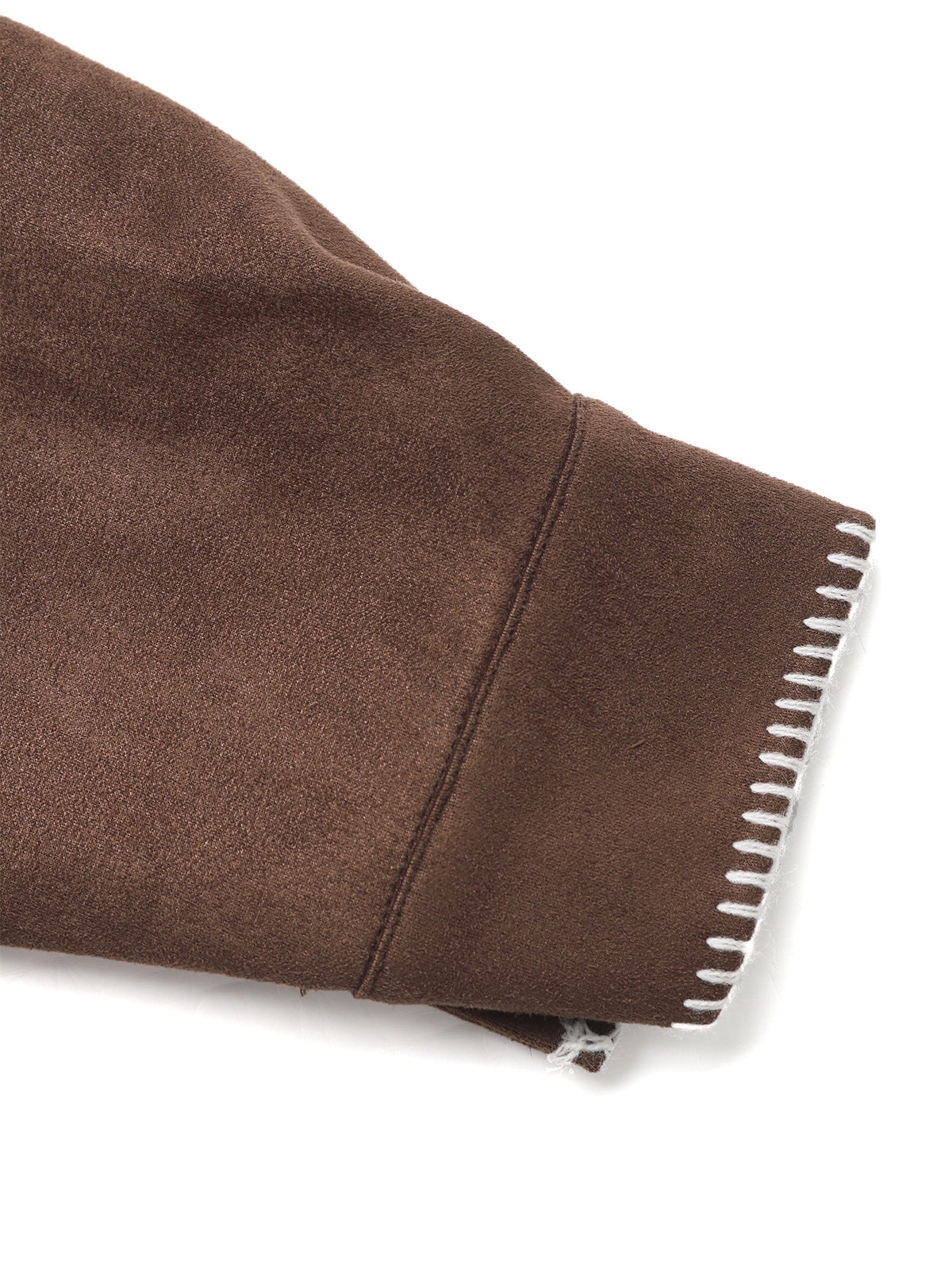 Close-up of a brown suede or faux-suede garment sleeve with a white zigzag trim along the cuff, shown on a white background.