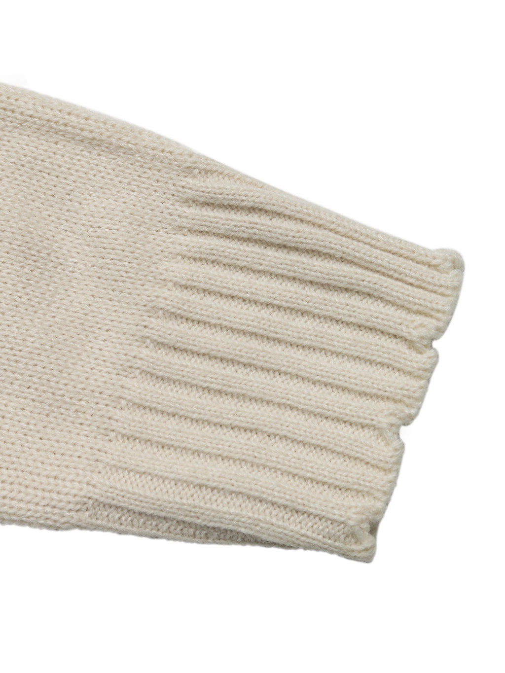 Beige knitted fabric on a white background